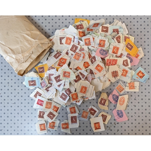 2715 - UK Security Overprints; a packet of KG6 and QE stamps on piece, all off receipts, and including a sc... 