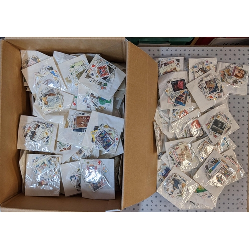 12 - Mixed Lots; box with 169 packets each with 50 different used UK (decimal commems and Christmas), and... 