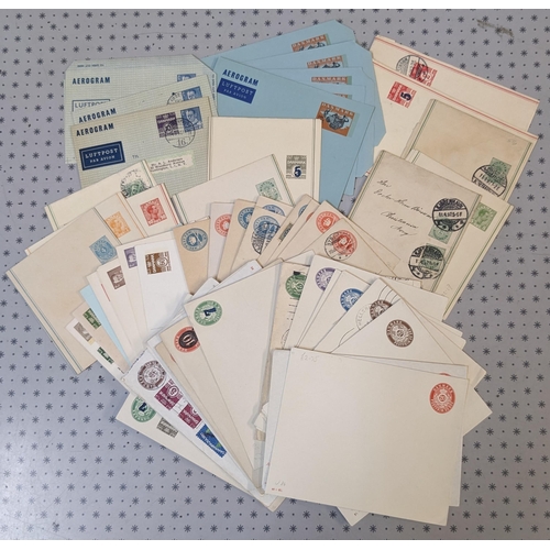 130 - Denmark; Postal Stationery; plastic tub with good variety of postcards, envelopes, newspaper wrapper... 