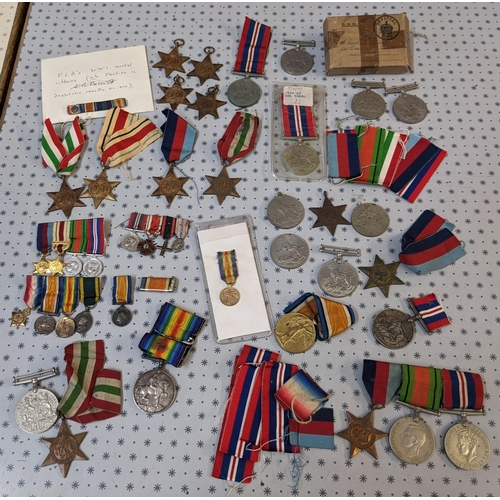 48 - Medals; old biscuit tin with an accumulation including WW1British War Medal (12), Victory (20), 1914... 