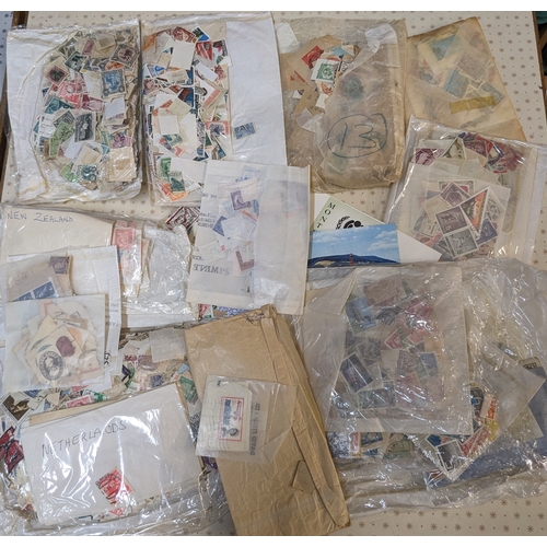 371 - Mixed Lots; A4 paper box filled with 1,000s of loose world stamps (mainly off-paper), some on pages/... 