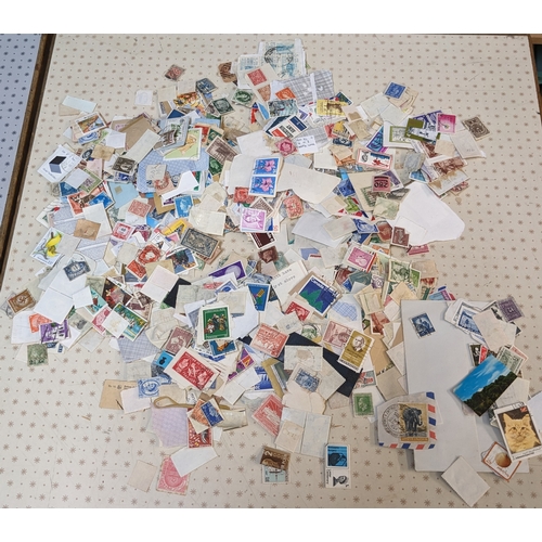 371 - Mixed Lots; A4 paper box filled with 1,000s of loose world stamps (mainly off-paper), some on pages/... 