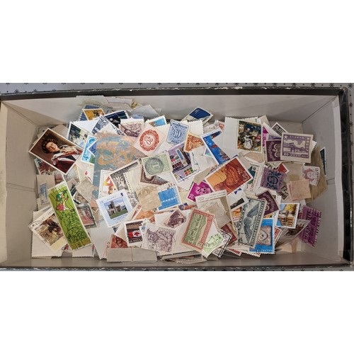 1007 - Mixed Lots; small box with about 120g net weight of loose world (non-UK) stamps. (1,000s)... 