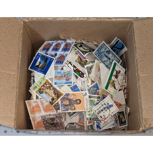 1006 - Mixed Lots; small box with about 120g net weight of loose world (non-UK) stamps. (1,000s)... 