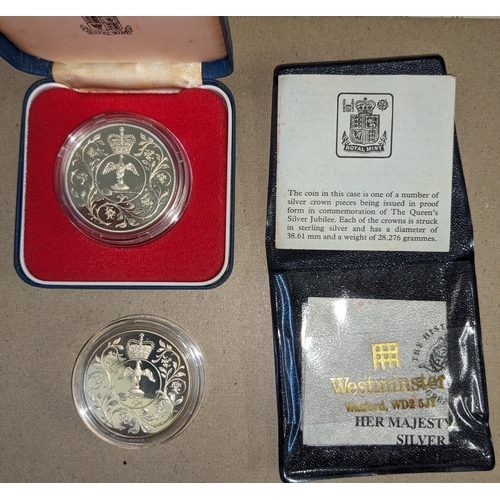 1128 - UK Coins; 1977 Silver Jubilee silver proof crowns - one in original box (outside of box dirty), and ... 