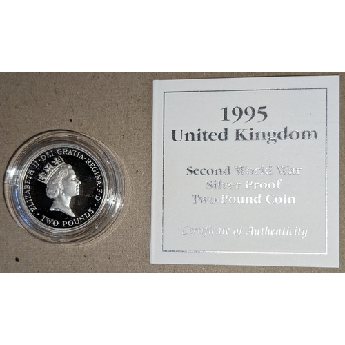 1164 - UK Coins; 1995 Second World War £2 silver proof in capsule.