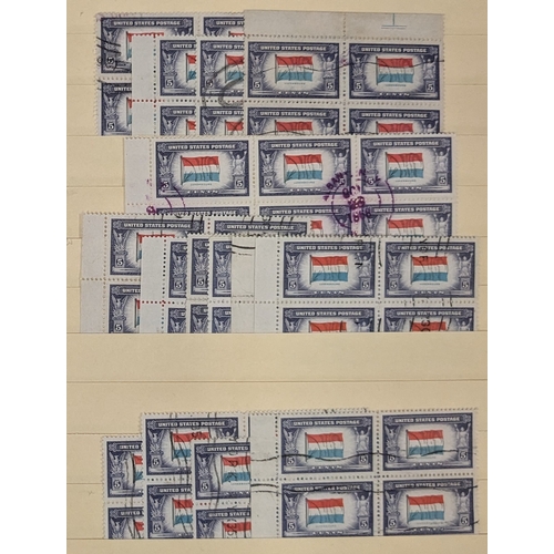 351 - USA; 1943-44 Flags of Oppressed Nations series unmounted mint and used stock in old stock-album. Com... 