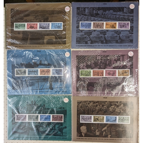 1487 - Canada; 1989-95 complete set of seven presentation packs for the WW2 50th Anniversary blocks and FDC... 