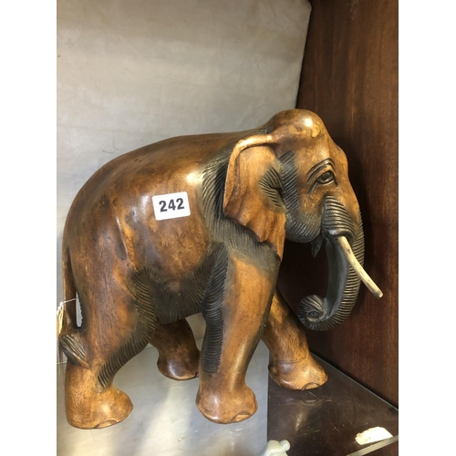 242 - LARGE WOODEN CARVED ELEPHANT