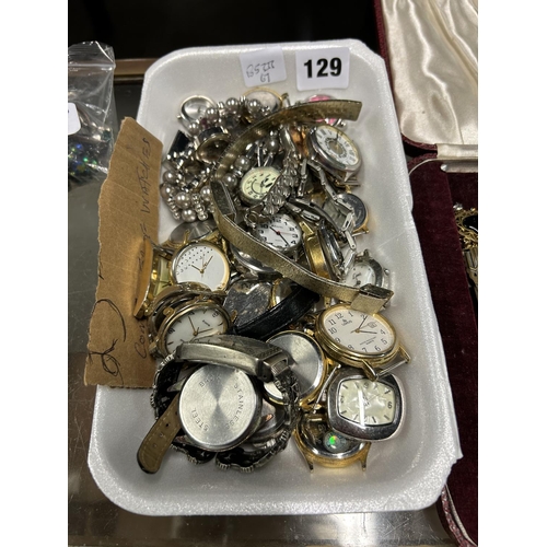 129 - CONTAINER FULL OF WATCHES