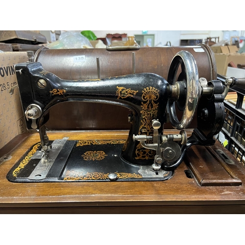 130 - BOXED OLD SEWING MACHINE