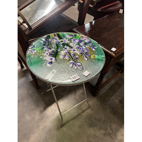 487 - PAINTED GLASS FOLDING ROUND TABLE