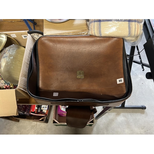 95 - LEATHER SUITCASE