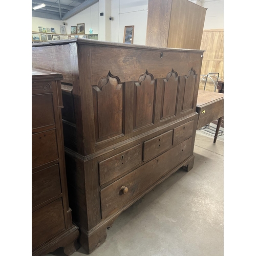 392 - LARGE OAK COFFER WITH DRAWERS