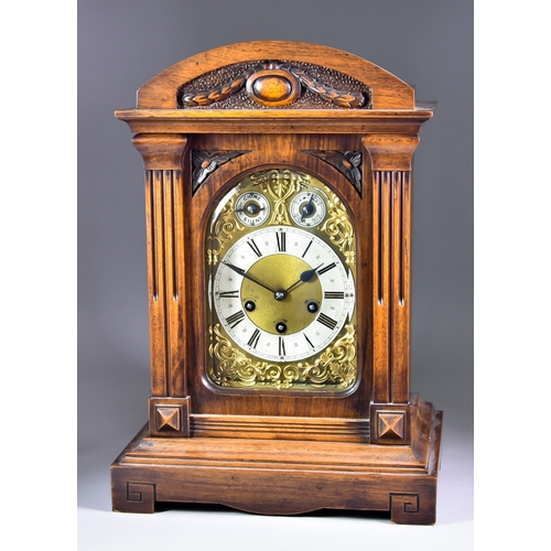 120 - An Early 20th Century German Mahogany Cased Mantle Clock, by Junghans, the brass dial with 5.25ins d... 