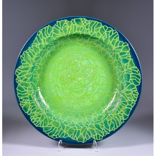 157 - Sally Tuffin (born 1938) for Dennis China Works, 2016, charger with tube-lined green floral design o... 