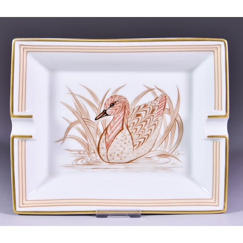 183 - A Hermes Porcelain Rectangular Ashtray, decorated with a duck amongst reeds, gilt edged, 7.875ins x ... 