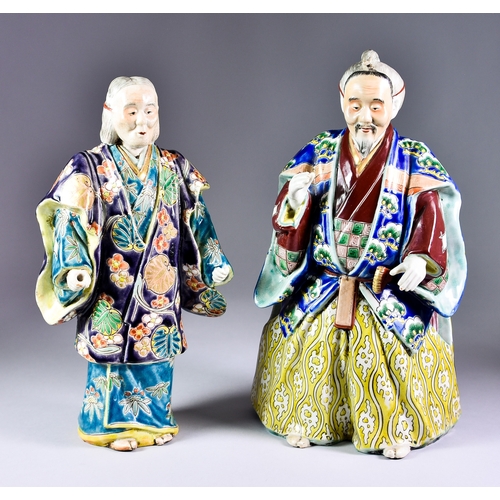 24 - A Pair of Japanese Porcelain Figures of Takasago Elders, decorated in colours, 12ins (30.5cm) and 11... 