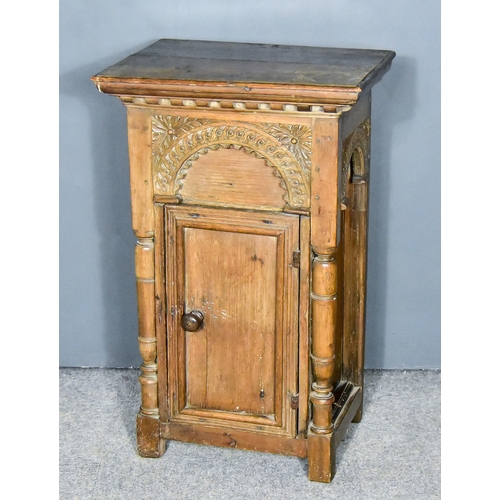 259 - An Old Oak Bedside Cabinet, with moulded and dentil cornice, arcaded frieze, fitted one shelf enclos... 