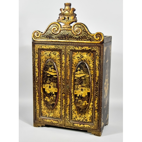 27 - A Chinese Black Lacquer Table Cabinet, Late 19th Century, the whole decorated in gilt with chinoiser... 