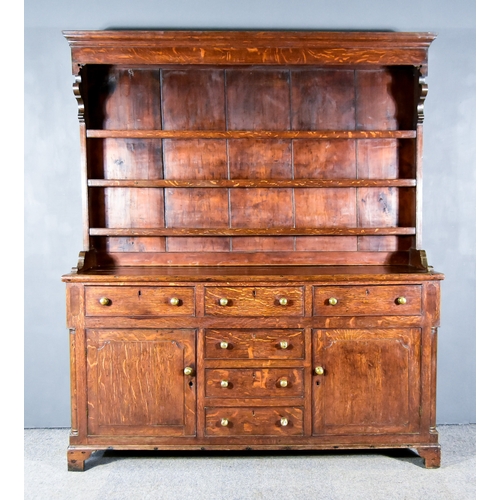 271 - An Early 18th Century Oak Dresser, the upper part with moulded cornice, plain frieze, fitted three o... 