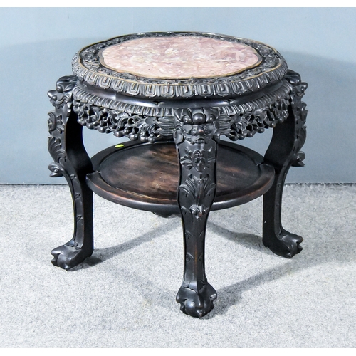 28 - A Chinese Hardwood Two-Tier Jardiniere Stand, 19th Century, with shaped pink flecked marble slab ins... 