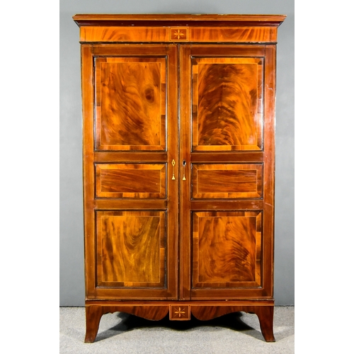 281 - A George III Figured Mahogany Wardrobe, the whole inlaid with stringings and cross bandings, with mo... 