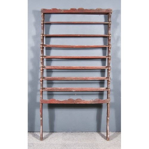 287 - A Late 18th/Early 19th Century Painted Pine Seven Tier Rail, with shaped cresting and sides, and wit... 