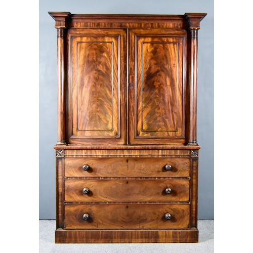 298 - A William IV Figured Mahogany Linen Press, in the Gillows Manner, with inverted breakfront and mould... 