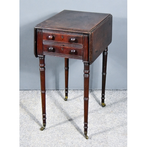 302 - A Victorian Mahogany Drop Leaf Occasional Table, fitted two real and two dummy drawers, and on turne... 