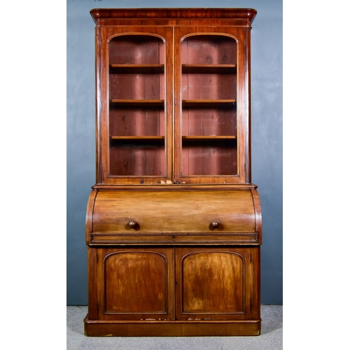 310 - A Victorian Mahogany Cylinder Bureau Bookcase, the upper part with moulded cornice, plain frieze, fi... 