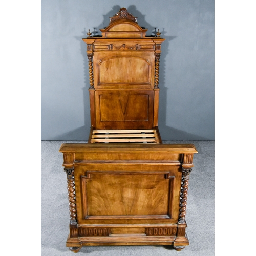 325 - A Continental 19th Century Walnut 3ft Bedstead, the head board with arched and moulded top with shel... 