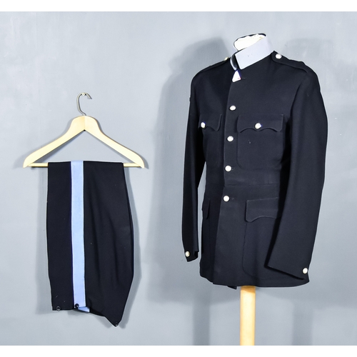 37 - An SAS Officer's Dress Tunic and Trousers, blue tunic with light blue collar, SAS stay-bright button... 