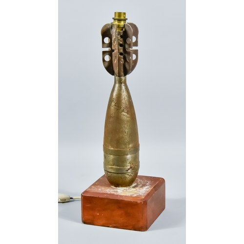 41 - A 20th Century Mortar Shell, converted to table lamp on metal base, height 18ins overall, base 6ins ... 