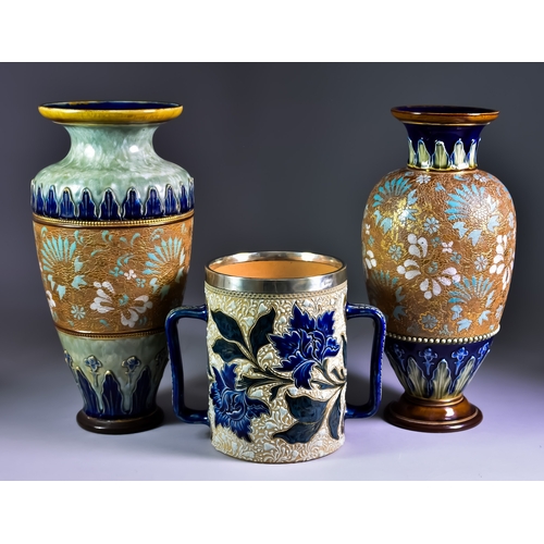 752 - Royal Doulton Stoneware - Three pieces, comprising - a two-handled tyg of large proportions, decorat... 