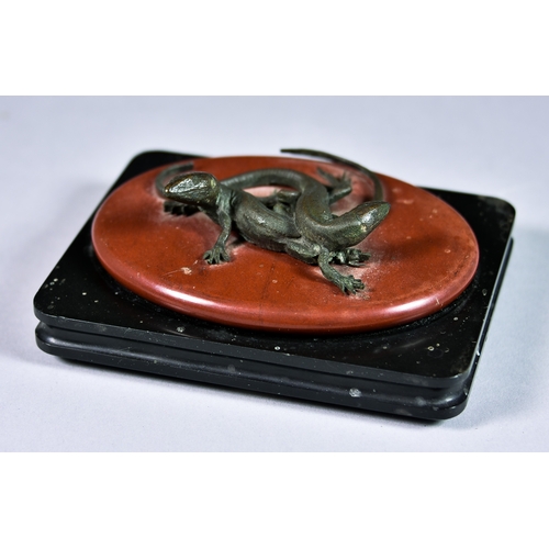 853 - Continental School - Patinated bronze group of two lizards, mounted on red marble oval plaque, and o... 