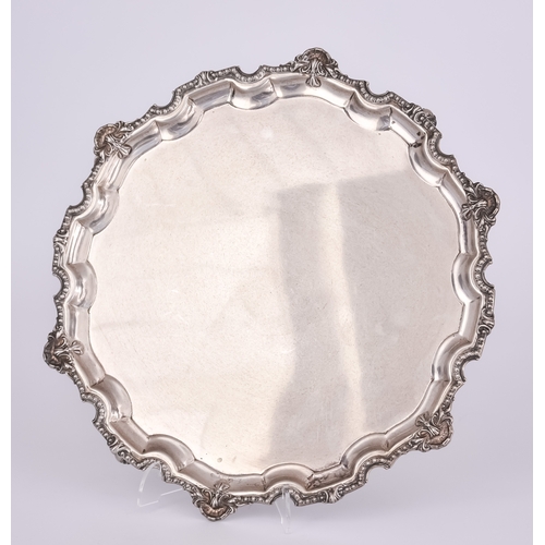 854 - An Edward VIII Silver Circular Salver of 18th Century Design,Â by Mappin & Webb, Sheffield 1936, the... 