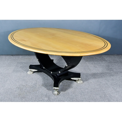 907 - A Modern Beechwood and Ebonised Oval Drop Leaf Dining Table,Â by Michael WestgateÂ the top inlaid wi... 