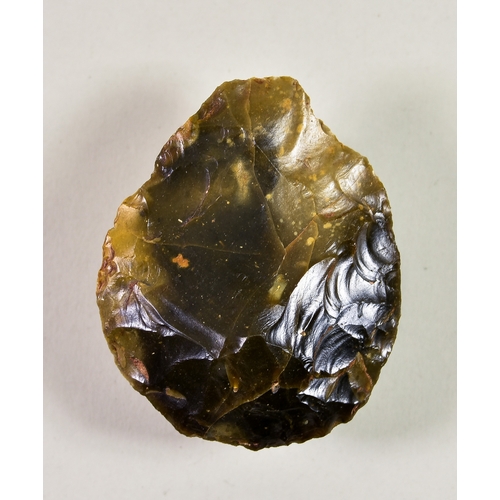 281 - An Acheulean Knapped Handaxe, Lower Palaeolithic c. 410,000 BP, of Wymer type E form, in brown and g... 