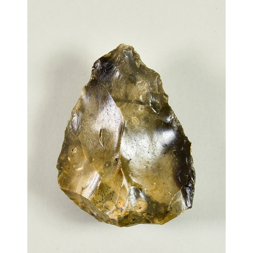285 - An Acheulean Knapped Handaxe, Lower Palaeolithic c. 410,000 BP, of Wymer type H form, in grey flint,... 