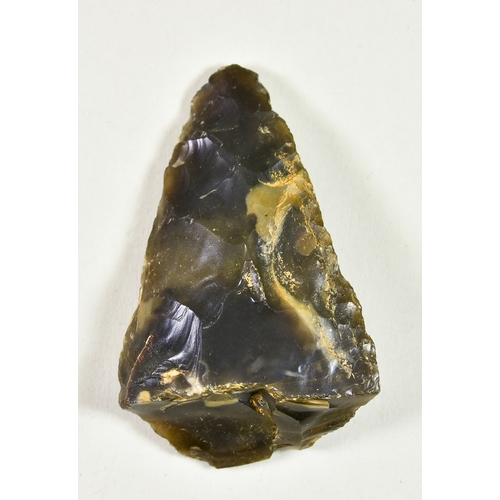 302 - An Acheulean Knapped Handaxe, Lower Palaeolithic c. 410,000 BP, of Wymer type G form, in grey flint,... 