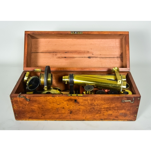 295 - A 19th Century Lacquered Brass Microscope by Conrad Beck, in mahogany case, 16ins wide x 6ins deep x... 
