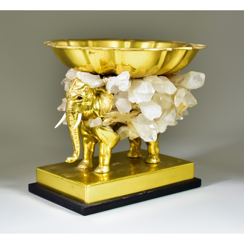 300 - An Unusual Gold Coloured Plated Metal Elephant, supporting a gold coloured plated metal tray, the bo... 