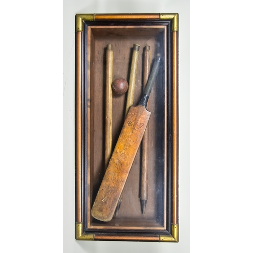 302 - A Display Box of Cricketing Interest, Early 20th Century, comprising - bat, ball and three stumps, t... 