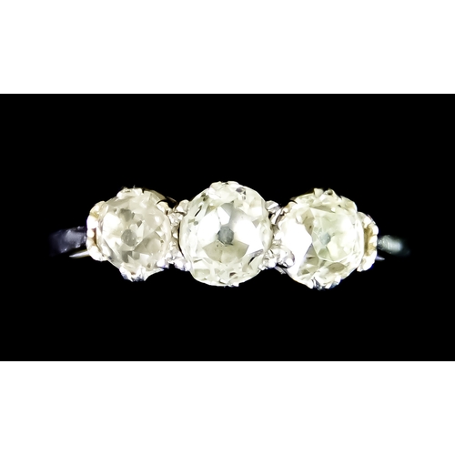 A White Metal Ring set with three old European cut diamonds of ...