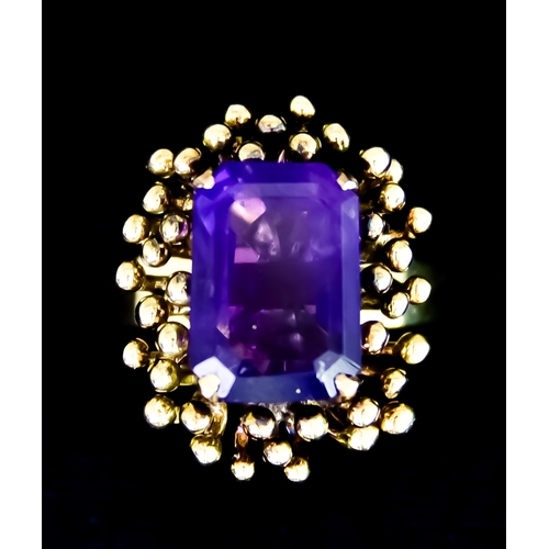 607 - An 18ct Gold Faceted Amethyst Dress Ring, set with an amethyst stone of approximately 2.5ct, size Q,... 