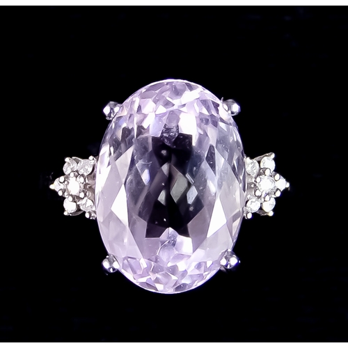 623 - A 9ct White Gold Kunzite and Diamond Ring, set with a centre faceted Kunzite, approximately 8.2ct, f... 