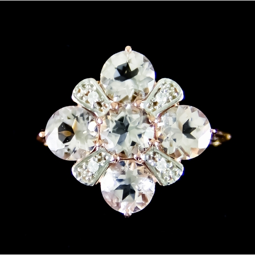 627 - A 9ct Rose Gold Paste Set Dress Ring, set with four large paste faceted stones interspaced by smalle... 