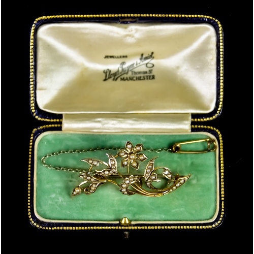 628 - A 9ct Gold and Seed Pearl Brooch, in the form of a floral display, 50mm x 25mm, total gross weight 4... 