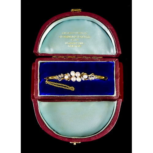 629 - A 9ct Gold Pearl and Diamond Set Bracelet, set with six cultured pearls and small white diamonds, 63... 